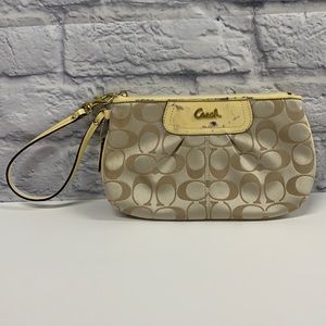 Coach yellow and tan wristlet
